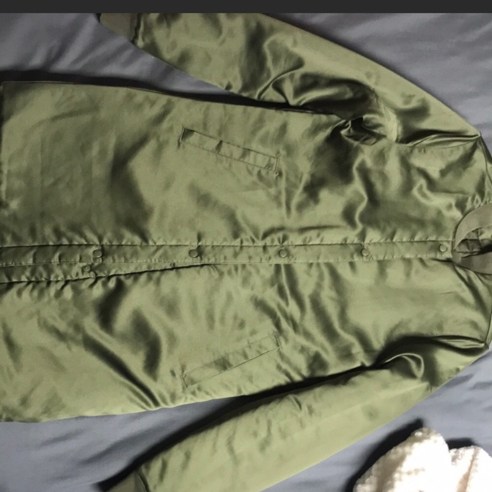 Reversible satin puma coat.